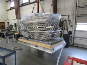 Comes on a custom pallet for storage or can be lifted by a crane