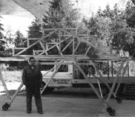 Maurice ("Maury") Drenkel with the bricking scaffolding system known as the Multi-Ring or Pneumat-O-Ring
